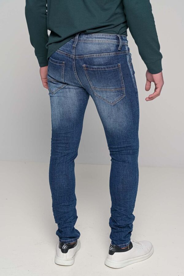 Παντελόνι jean ίσια γραμμή με ξεβάμματα και "φθορές"